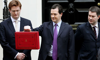 The new leather of the £4,000 replica budget briefcase stank as much as its contents